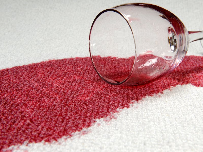 Red wine spilled on white carpet from Matson Rugs, Inc in Berlin, CT